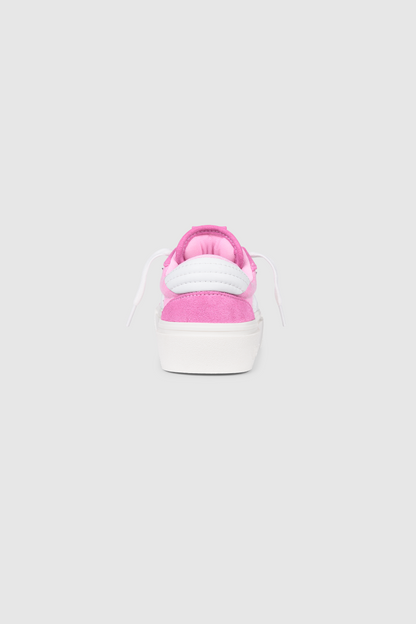 Rear view of the PESOCLO Peso Skate sneaker in pink and white with white laces, showcasing a chic canvas-suede mix and highlighted by a puffed eagle detail, set against a plain light gray background.
