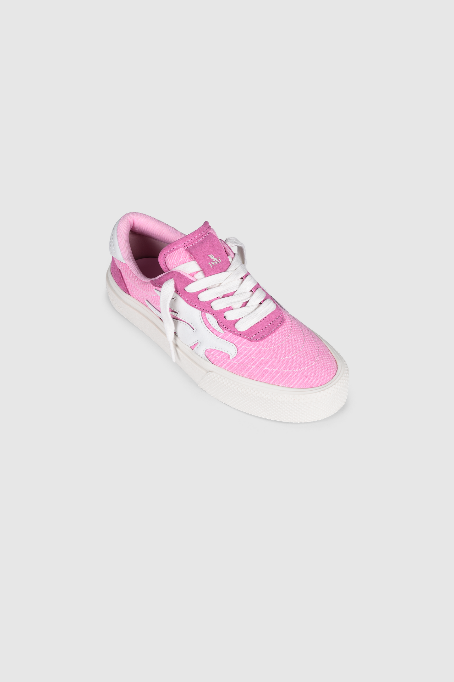 A single Peso Skate sneaker by PESOCLO, featuring a pink and white colorway with white laces crafted from a premium canvas-suede mix, is displayed on a light gray background.
